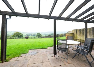 Looking across the rural countryside from under the Leat House canopy